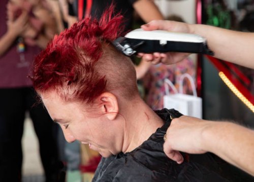 a lady having her head shaved - hairstyle stock pictures, royalty-free photos & images