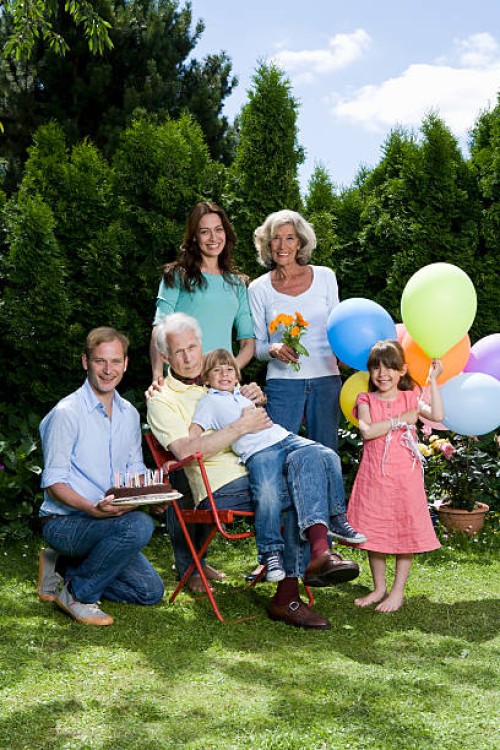 a multi-generational family celebrating a birthday, outdoors - garden decoration stock pictures, royalty-free photos & images