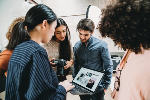 a photographer is taking a look at the pictures with models and directors - fashion stock pictures, royalty-free photos & images