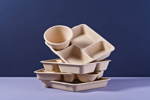 a pile of disposable paper tv dinner tray - junk food stock pictures, royalty-free photos & images
