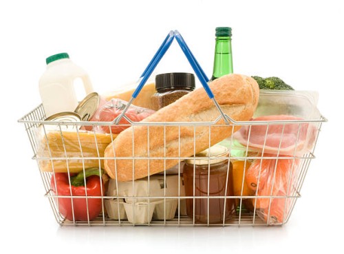 a shopping basket filled with food - food stock pictures, royalty-free photos & images