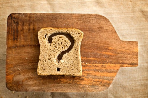 a slice of bread toast with a question mark - food stock pictures, royalty-free photos & images
