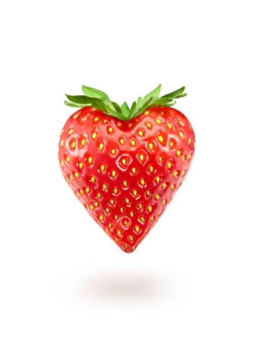 a strawberry in the shape of a heart - food stock pictures, royalty-free photos & images