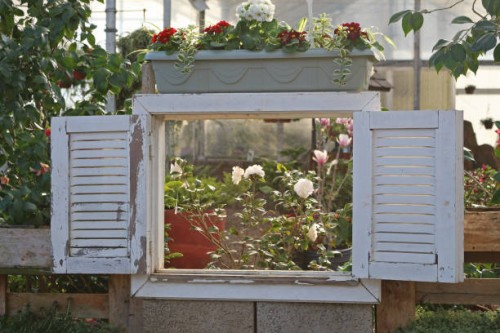 a window in the garden. - garden decoration stock pictures, royalty-free photos & images