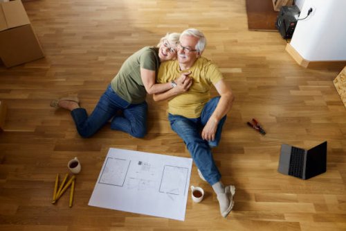 above view of happy senior couple relaxing during home relocation. - home decoration stock pictures, royalty-free photos & images