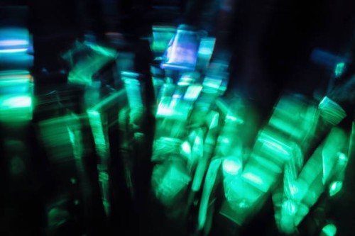 abstract colorful surreal cyberpunk night city lights bokeh on black background - concert stock pictures, royalty-free photos & images