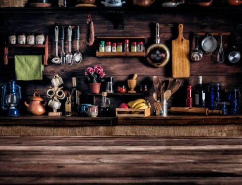 actual rustic kitchen with utensils for cooking. table at the foreground with copy space - food stock pictures, royalty-free photos & images