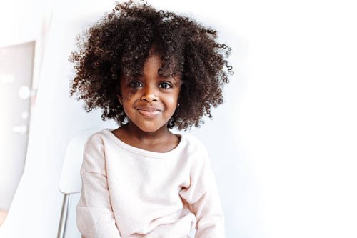 adorable girl looking at camera - hairstyle stock pictures, royalty-free photos & images
