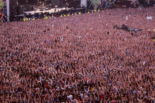 Aerial view of a large crowd in the audeicne at Freddie Mercury tribut concert, Wembley Stadium, London, 20th April 1992.