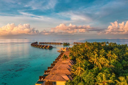 aerial view of luxury resort in maldives - travel stock pictures, royalty-free photos & images