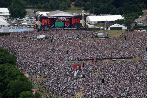 Aerial view shows the Live 8 concert for Africa in Hyde Park in London 02 July 2005. Mega-stars from U2 to Madonna mixed smash hits with powerful...