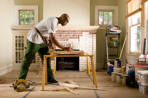 african american man renovating home interior. - home decoration stock pictures, royalty-free photos & images