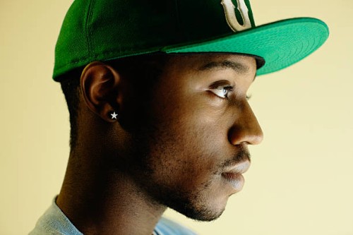 african american man wearing baseball cap - fashion stock pictures, royalty-free photos & images