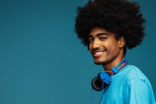 african american man with african hairstyle using phone - fashion stock pictures, royalty-free photos & images