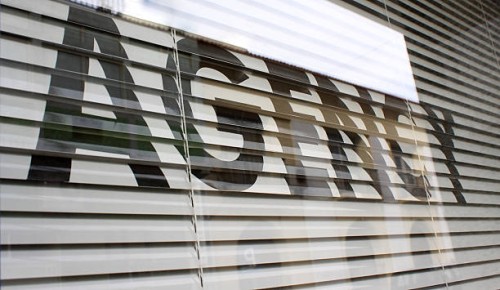 agency text on the glass window - fashion stock pictures, royalty-free photos & images