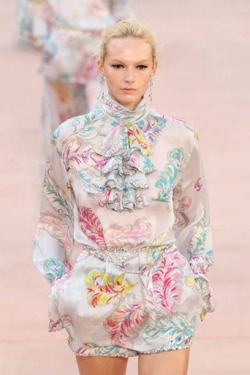 Alex Consani walks the runway during the Chanel Paris Womenswear Spring-Summer 2025 show as part of Paris Fashion Week on October 01, 2024 in Paris,...