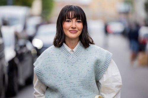 Alexandra Pereira wears green sleeveless pullunder, white button shirt outside Tods during the Milan Fashion Week Menswear Spring/Summer 2025 on...