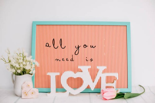 all you need is love text neon text in mockup - home decoration stock pictures, royalty-free photos & images