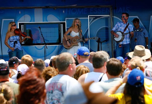 American country singer/songwriter Taylor Swift , preforms in the Best Buy Fun Zone concert before practice for the NASCAR Nextel Cup Series USG...