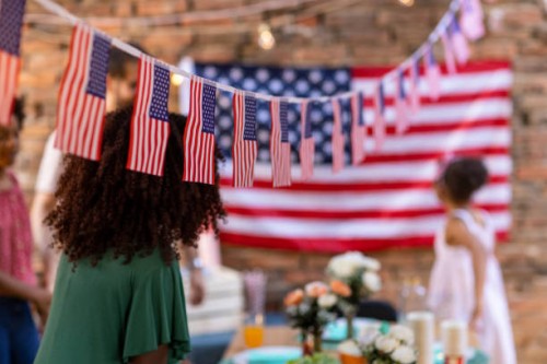 american flag pennant at backyard during celebration of national holiday - home decoration stock pictures, royalty-free photos & images