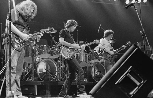 American rock group The Grateful Dead performing on stage, 1981. Left to right: Jerry Garcia , Bob Weir and Phil Lesh.