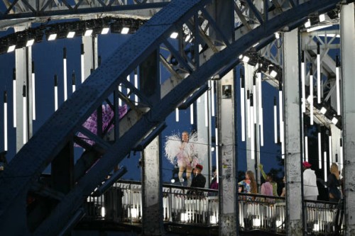 An amputee fashion model displays creations while walking a catwalk erected along the Passerelle Debilly bridge on the Seine river during the opening...