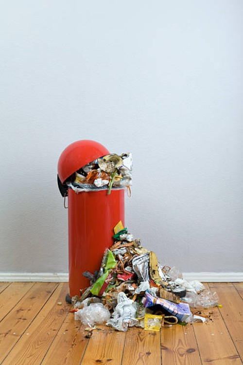 an overflowing garbage can of rotting food and recyclables - food stock pictures, royalty-free photos & images
