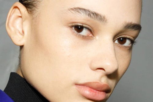 Annemary Aderibigde poses backstage at the Jil Sander fashion show during the Milan Fashion Week Womenswear Fall/Winter 2023/2024 on February 24,...