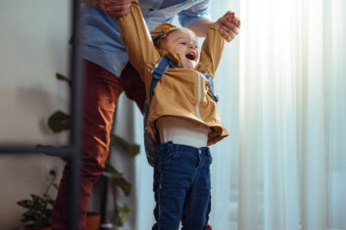 anonymous dad getting his daughter ready to go outside - junk food stock pictures, royalty-free photos & images