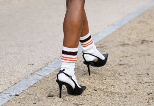 Anttonia is seen wearing black heels, white striped socks outside the Lacoste show during the Womenswear Fall/Winter 2024/2025 as part of Paris...