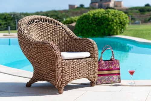 armchair at the poolside - garden decoration stock pictures, royalty-free photos & images