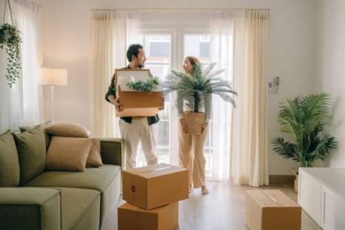 asian couple moving in new house. - home decoration stock pictures, royalty-free photos & images