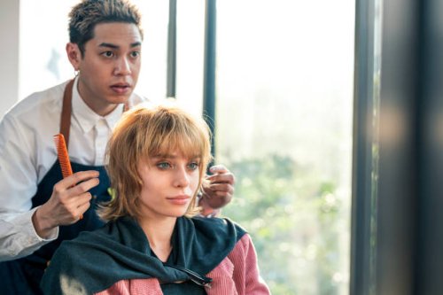 asian hairdresser owner is giving advice about hairstyle to his customer at hair salon. - hairstyle stock pictures, royalty-free photos & images