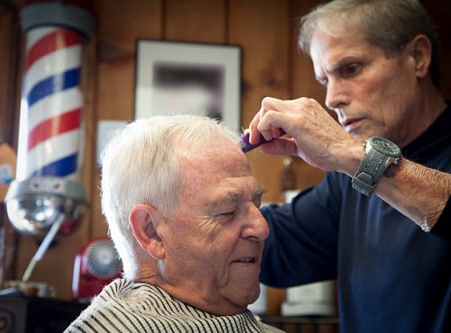 at the barber - hairstyle stock pictures, royalty-free photos & images