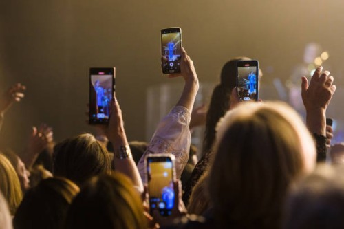 Audience during Roberto Carlos concert with cell phones recording and live with facebook live, instagram, igtv, snapchat and tiktok at Vibra Sao...