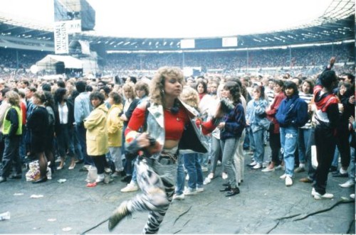 Audience gather outside the Wembley arena prior to the Michael Jackson concert, 15th July 1988.