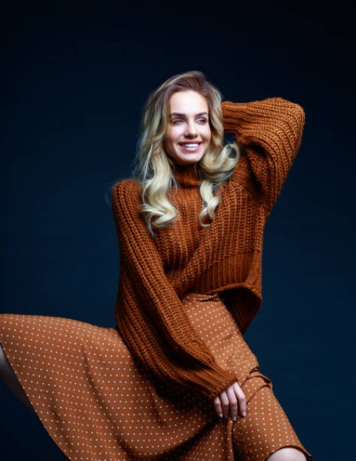 autumn portrait of smiling woman in brown clothes - fashion stock pictures, royalty-free photos & images