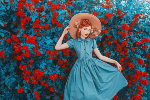awesome redhead model expresses emotions. valentines day background. fabulous retro girl with red lips in mint dress on awesome summer background. woman portrait. roses bush. - fashion stock pictures, royalty-free photos & im