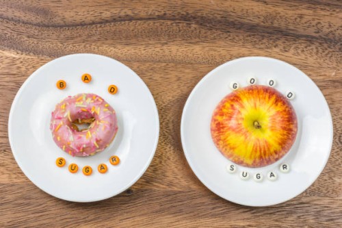 bad sugar and good sugar. medical concept - junk food stockfoto's en -beelden