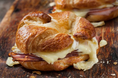 baked ham and brie croissant sandwiches with dijon mustard - junk food stock pictures, royalty-free photos & images
