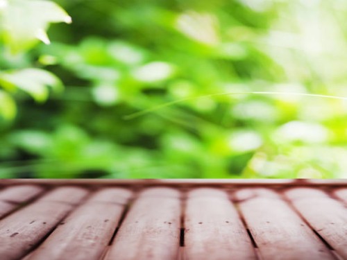 bamboo table on blur nature background - garden decoration photos et images de collection