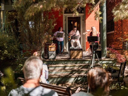band of mature people playing music and singing outdoors - concert stock pictures, royalty-free photos & images