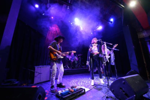 band performing onstage at small venue - concert stock pictures, royalty-free photos & images