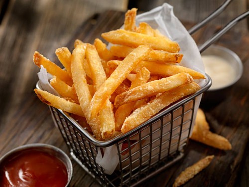 basket of french fries - junk food stock pictures, royalty-free photos & images