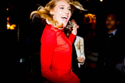 beautiful blond woman dancing by friends at back yard during garden party - fashion stock pictures, royalty-free photos & images