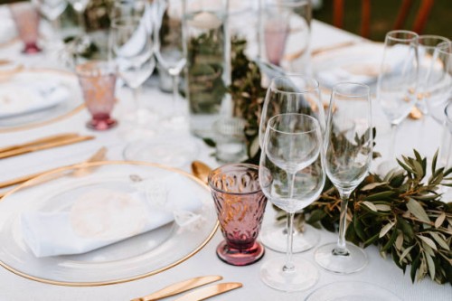 beautiful boho wedding table decoration with olive branches and rose drink glasses in majorca - home decoration stock pictures, royalty-free photos & images