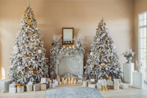 beautiful christmas gift boxes on the floor near the christmas tree in the room. - home decoration stock pictures, royalty-free photos & images