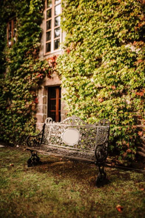 beautiful iron bench - garden decoration stock pictures, royalty-free photos & images