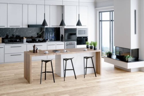 beautiful kitchen in luxury home with island - home decoration stock pictures, royalty-free photos & images
