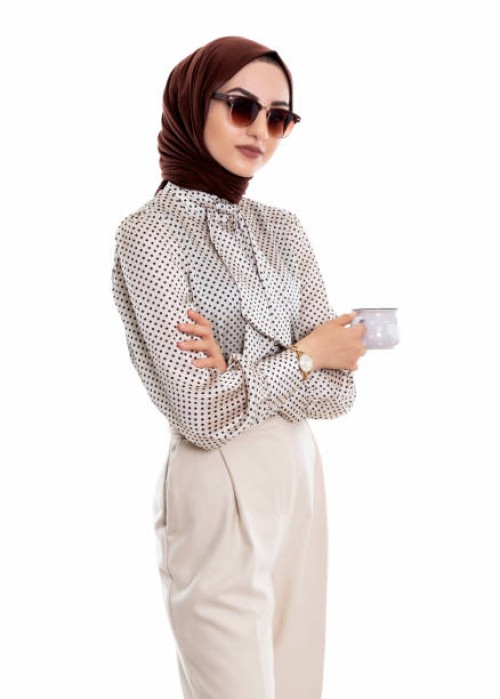 beautiful muslim female holding coffee cup - fashion stock pictures, royalty-free photos & images